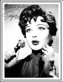 Jimmy James as 
Judy Garland