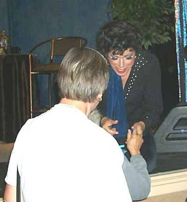 David signing autographs